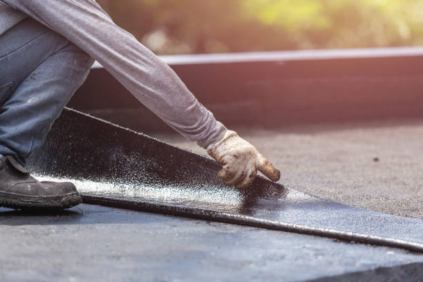 Professional Waterproofing technician working in Portland, IN